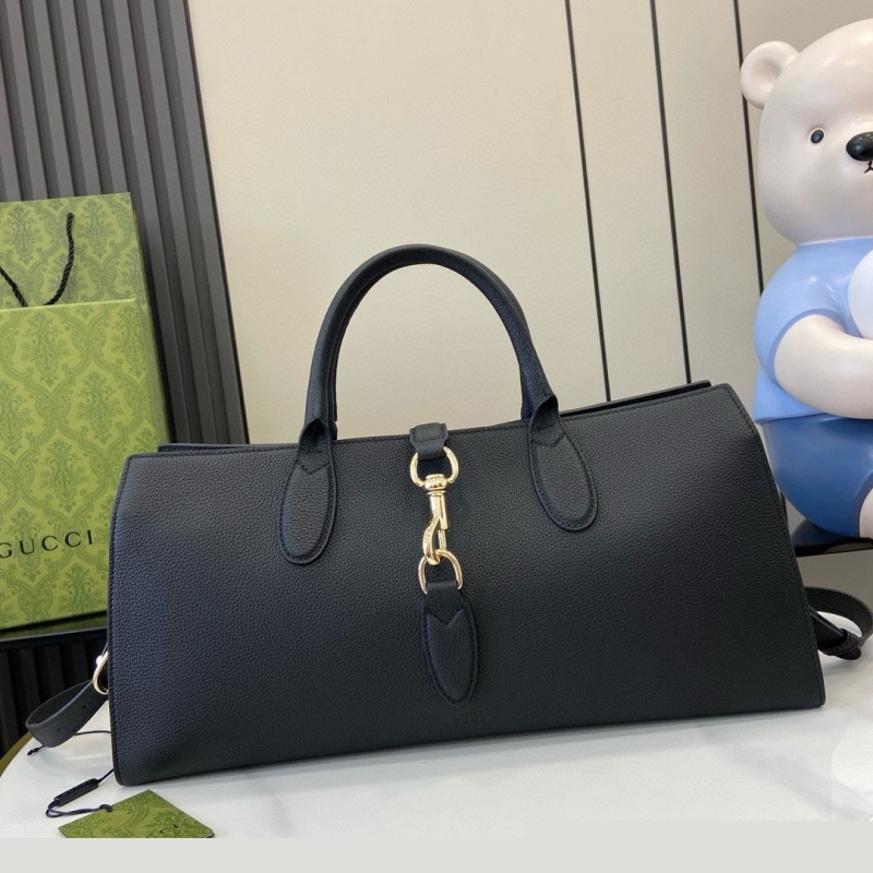 G*u*i top handle bags